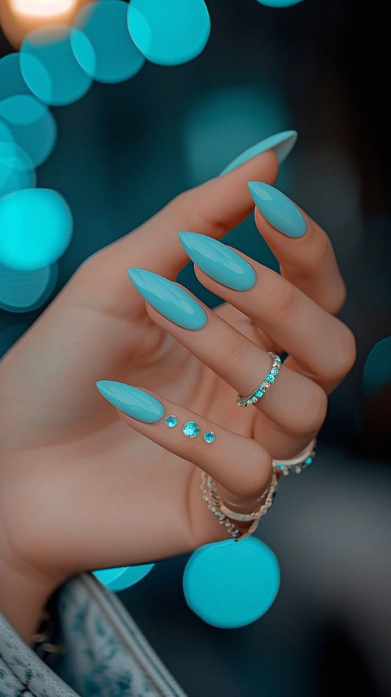 acrylic nail designs 2026 turquoise almond glow
