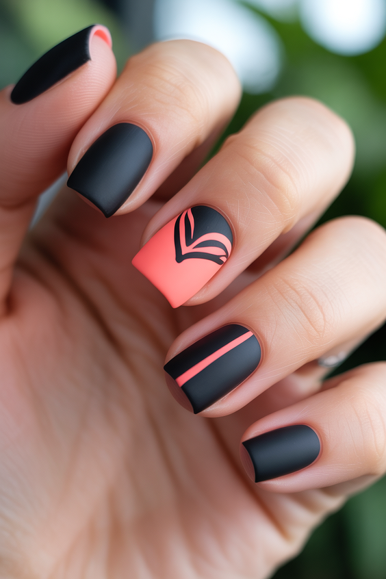 black nails ideas 2026 matte coral graphic