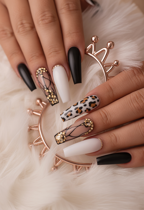 coffin nail designs 2026 Black And White Coffin Nails With Leopard And Gold Web Accents