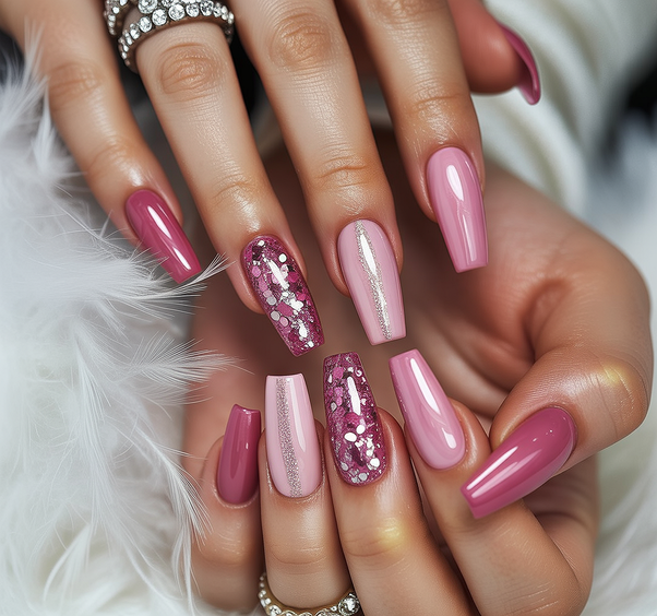 coffin nail designs 2026 Pink Coffin Nails With Glitter And Soft Shimmer Accents
