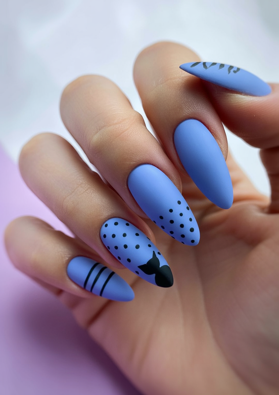 stylish almond nails 2026 matte blue graphic