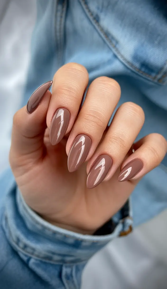 gel nail designs 2026 Glossy mocha tones that feel warm and modern