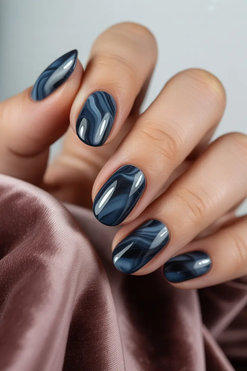 nails designs ideas February 2026 Smoky blue marble nails for a calm winter mood