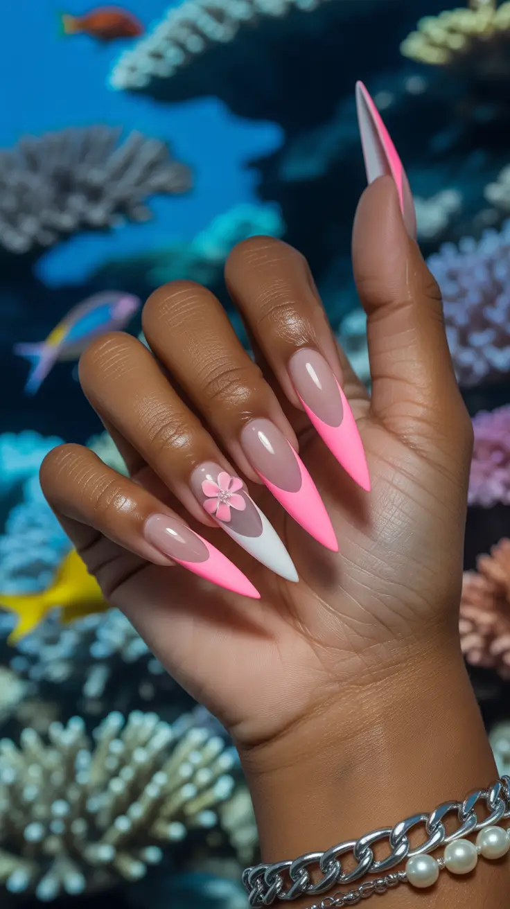 nails designs ideas February 2026 Playful pink stiletto tips with floral Valentine energy
